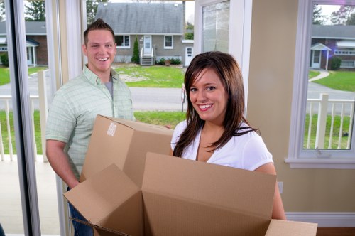 Loading boxes and furniture into a removal van in Clapham