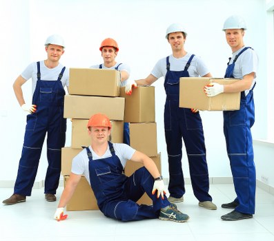 Man and van removals team working in a Clapham residential street