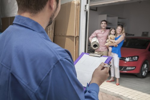 Careful stairway handling during an apartment move in Clapham