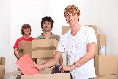 Packed moving boxes and checklist for a Clapham house move